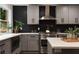 Close-up of the updated kitchen with modern appliances and textured backsplash at 1218 Crestwood Se Dr, Atlanta, GA 30316