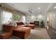 Bright living room with large windows, comfortable sectional sofa and neutral decor at 1218 Crestwood Se Dr, Atlanta, GA 30316