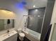 Modern bathroom featuring a shower-over-tub, stylish vanity, and contemporary fixtures at 560 Dutch Valley Road # 2412, Atlanta, GA 30324
