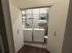Convenient laundry closet featuring a side-by-side washer and dryer setup, maximizing space and efficiency at 560 Dutch Valley Road # 2412, Atlanta, GA 30324