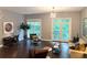 Inviting living room featuring hardwood floors, ample natural light, and stylish contemporary furnishings at 560 Dutch Valley Road # 2412, Atlanta, GA 30324