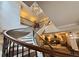 Grand lobby with spiral staircase, high ceilings, elegant lighting, and comfortable seating area at 560 Dutch Valley Road # 2412, Atlanta, GA 30324