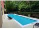 Inviting outdoor swimming pool with comfortable lounge chairs, perfect for relaxation and recreation at 560 Dutch Valley Road # 2412, Atlanta, GA 30324