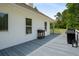 Spacious back deck is perfect for outdoor gatherings, equipped with a grill and a view of the property at 692 Brooks Woolsey Rd, Brooks, GA 30205