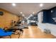 Finished basement featuring an at-home gym for the fitness enthusiast at 692 Brooks Woolsey Rd, Brooks, GA 30205