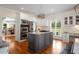 Gourmet kitchen with a center island, stainless steel appliances, and custom cabinetry at 692 Brooks Woolsey Rd, Brooks, GA 30205