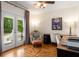 Bright office space with french doors and lovely hardwood flooring, ideal for working from home at 692 Brooks Woolsey Rd, Brooks, GA 30205