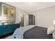 Relaxing bedroom with a large dresser, ensuite bath, and lots of natural light at 782 Brooke View Drive, Canton, GA 30115
