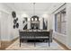 Dining room with modern decor, hardwood floors, white shiplap wall and bright lighting at 782 Brooke View Drive, Canton, GA 30115