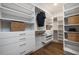 Walk-in closet with custom built-ins, drawers, shelving, and ample storage space at 782 Brooke View Drive, Canton, GA 30115