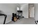Bright room with carpeted floor used as a music room and office space at 1045 Penny Ln, Roswell, GA 30076