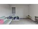 Bonus room featuring a large window and toys at 1045 Penny Ln, Roswell, GA 30076
