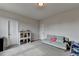 Bonus room featuring a lounge sofa and daybed at 1045 Penny Ln, Roswell, GA 30076
