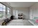 Bonus room featuring two large windows and toys at 1045 Penny Ln, Roswell, GA 30076