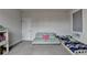 Bonus room featuring a lounge sofa and daybed at 1045 Penny Ln, Roswell, GA 30076