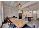 Spacious dining area showcasing an open floor plan with views of the modern kitchen at 1045 Penny Ln, Roswell, GA 30076