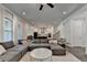 Spacious living room with an open layout, seamlessly connecting to the kitchen and dining area at 1045 Penny Ln, Roswell, GA 30076