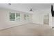 Spacious bedroom with two windows, ceiling fan, and a walk-in closet at 2737 Fontainebleau Drive, Dunwoody, GA 30360