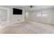 Large bedroom with tv and two entry ways at 2737 Fontainebleau Drive, Dunwoody, GA 30360