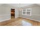 Dining room with hardwood floors, a chandelier, and view to kitchen at 2737 Fontainebleau Drive, Dunwoody, GA 30360