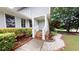 Inviting front porch with brick steps and landscaped walkway at 2737 Fontainebleau Drive, Dunwoody, GA 30360