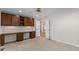Home office with custom built-ins and neutral carpet at 2737 Fontainebleau Drive, Dunwoody, GA 30360