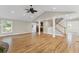 Spacious living room with hardwood floors, vaulted ceiling, and staircase to upper level at 2737 Fontainebleau Drive, Dunwoody, GA 30360