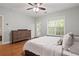 This bedroom features hardwood floors, an exterior door and a large window with natural light at 2873 Overlook Ne Way, Atlanta, GA 30324