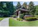 This covered gazebo features stone columns, a trash can and a sidewalk at 2873 Overlook Ne Way, Atlanta, GA 30324