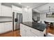Spacious kitchen with white cabinetry, stainless steel appliances, granite countertops, and hardwood floors at 2873 Overlook Ne Way, Atlanta, GA 30324