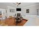 Inviting living room with a fireplace, hardwood flooring, and a comfortable seating arrangement at 2873 Overlook Ne Way, Atlanta, GA 30324