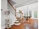Staircase leading to dining area with hardwood floors and natural light at 2873 Overlook Ne Way, Atlanta, GA 30324