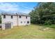 A spacious backyard features a shed and a garden, perfect for outdoor enjoyment at 45 Ratliff Dr, Covington, GA 30016