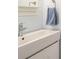 Modern bathroom featuring sleek vessel sink, contemporary faucet, and towel bar with a blue hand towel at 45 Ratliff Dr, Covington, GA 30016