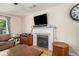 Living room fireplace with mantle and hardwood flooring at 45 Ratliff Dr, Covington, GA 30016