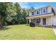 Well-manicured front yard showcasing the home's facade and covered porch at 45 Ratliff Dr, Covington, GA 30016