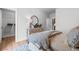 Bedroom featuring a comfy bed, decor, dresser with a round mirror, and a walk-in closet at 604 Southland Pass, Canton, GA 30115