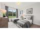 Shared bedroom with two twin beds, a dresser, and a window offering a view of the outdoors at 608 Southland Pass, Canton, GA 30115