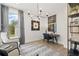 Home office featuring a window with a view and a dark wood desk with decor at 608 Southland Pass, Canton, GA 30115