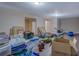 Unfinished basement with potential, featuring storage and ample space at 1041 Flat Rock Rd, Covington, GA 30014