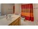 Bathroom with sink, toilet, and shower/tub combination, a functional and comfortable space at 1041 Flat Rock Rd, Covington, GA 30014