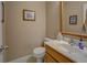 Powder room with framed mirror and modern sink at 1041 Flat Rock Rd, Covington, GA 30014
