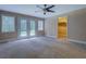 Bright bedroom with large French doors and a walk-in closet at 1041 Flat Rock Rd, Covington, GA 30014