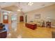 Bright, open living area with hardwood floors, vaulted ceiling, and cozy furniture at 1041 Flat Rock Rd, Covington, GA 30014
