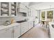 Gourmet kitchen with stainless steel appliances, custom cabinetry, and eat-in dining area at 314 Brooke View Trail, Canton, GA 30115