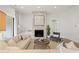 Inviting living room with a stone fireplace, comfortable seating, and elegant decor at 314 Brooke View Trail, Canton, GA 30115