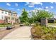 Community entrance sign with benches, landscaping and paver sidewalks at 350 Provenance Dr, Atlanta, GA 30328
