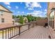 Exterior shot of a private patio featuring brown wood decking and brick wall at 350 Provenance Dr, Atlanta, GA 30328