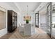 Formal dining room with natural light, chandelier, and a stylish china cabinet at 753 Brooke View Drive, Canton, GA 30115