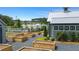 Community garden with raised beds, gravel pathways, and various community buildings at 753 Brooke View Drive, Canton, GA 30115